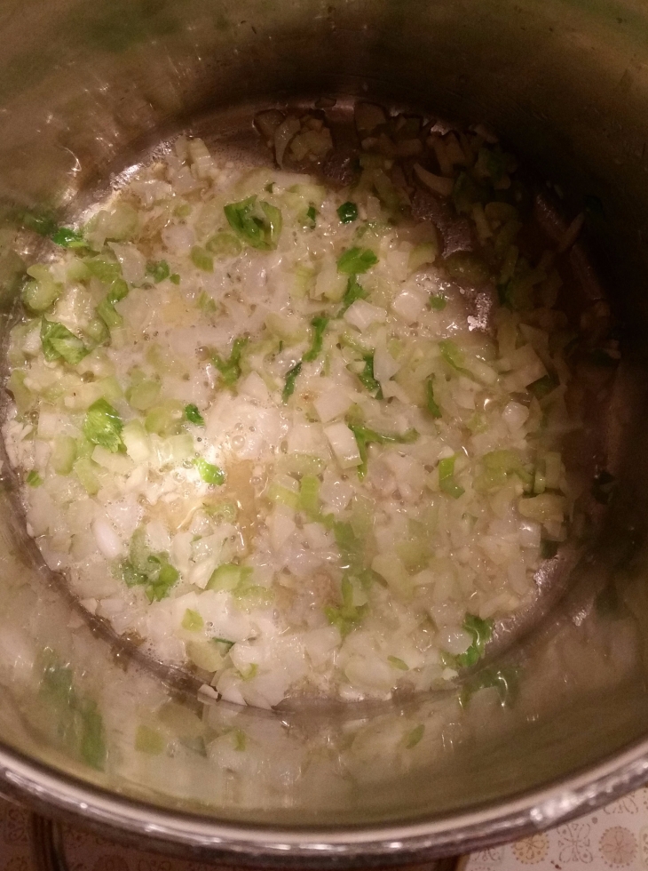 Saute onion, celery, and garlic in butter.